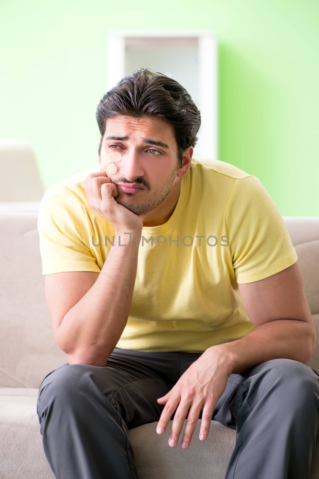 Young man at home after injury