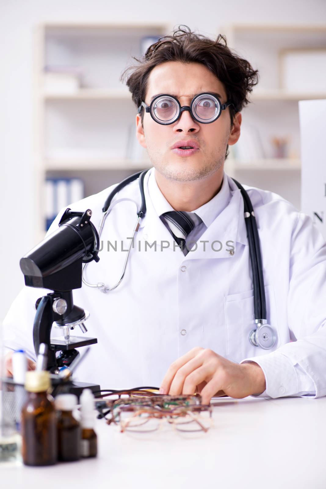 Funny eye doctor in humourous medical concept
