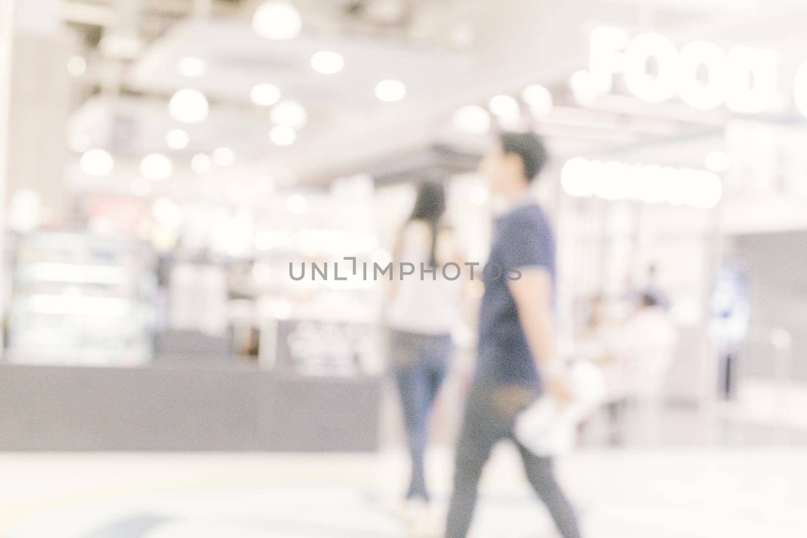 Abstract blur department store with shopping mall interior for background.abstract blur in supermarket for background.Abstract blur beautiful luxury shopping mall and retails store interior