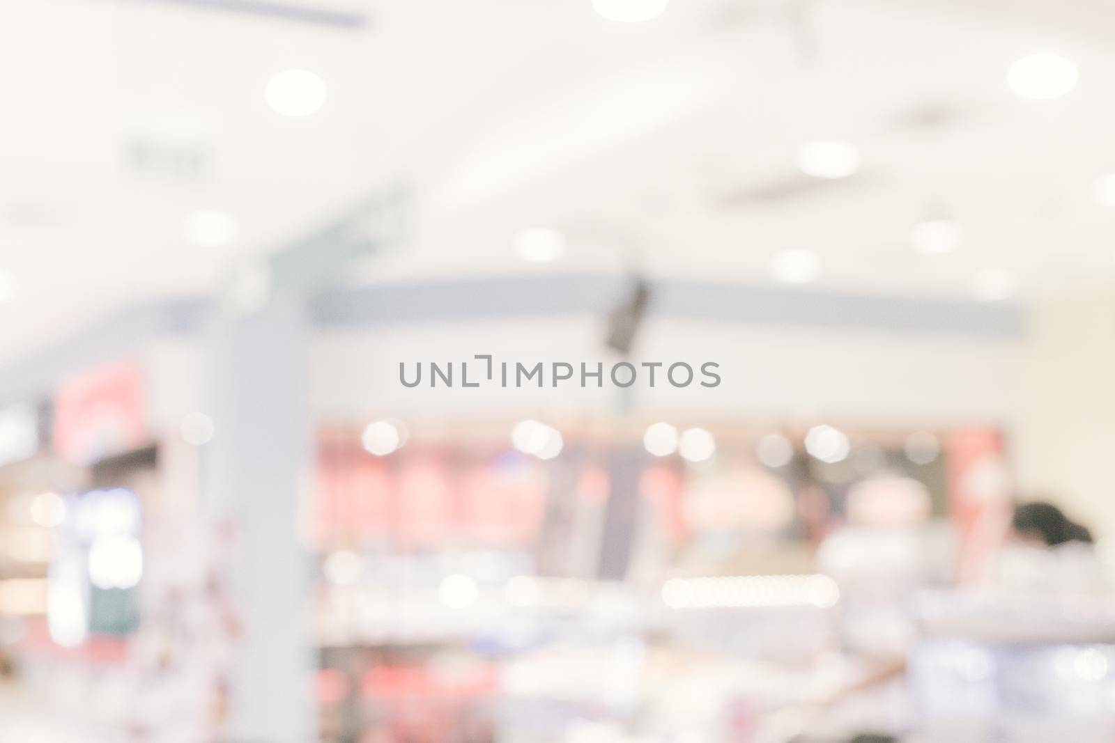 Abstract blur department store with shopping mall interior for background.abstract blur in supermarket for background.Abstract blur beautiful luxury shopping mall and retails store interior