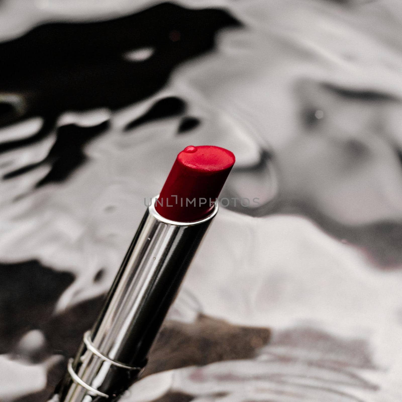 luxe red lipstick on silver background - make-up and cosmetics styled beauty concept by Anneleven