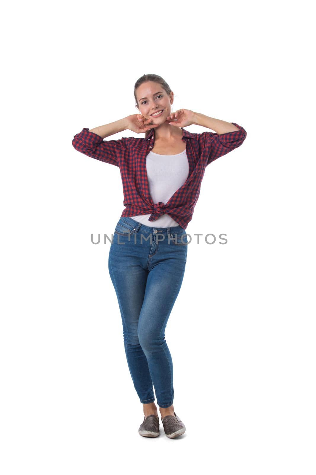 Full length portrait of smiling young woman posing dancing isolated on white background, casual people