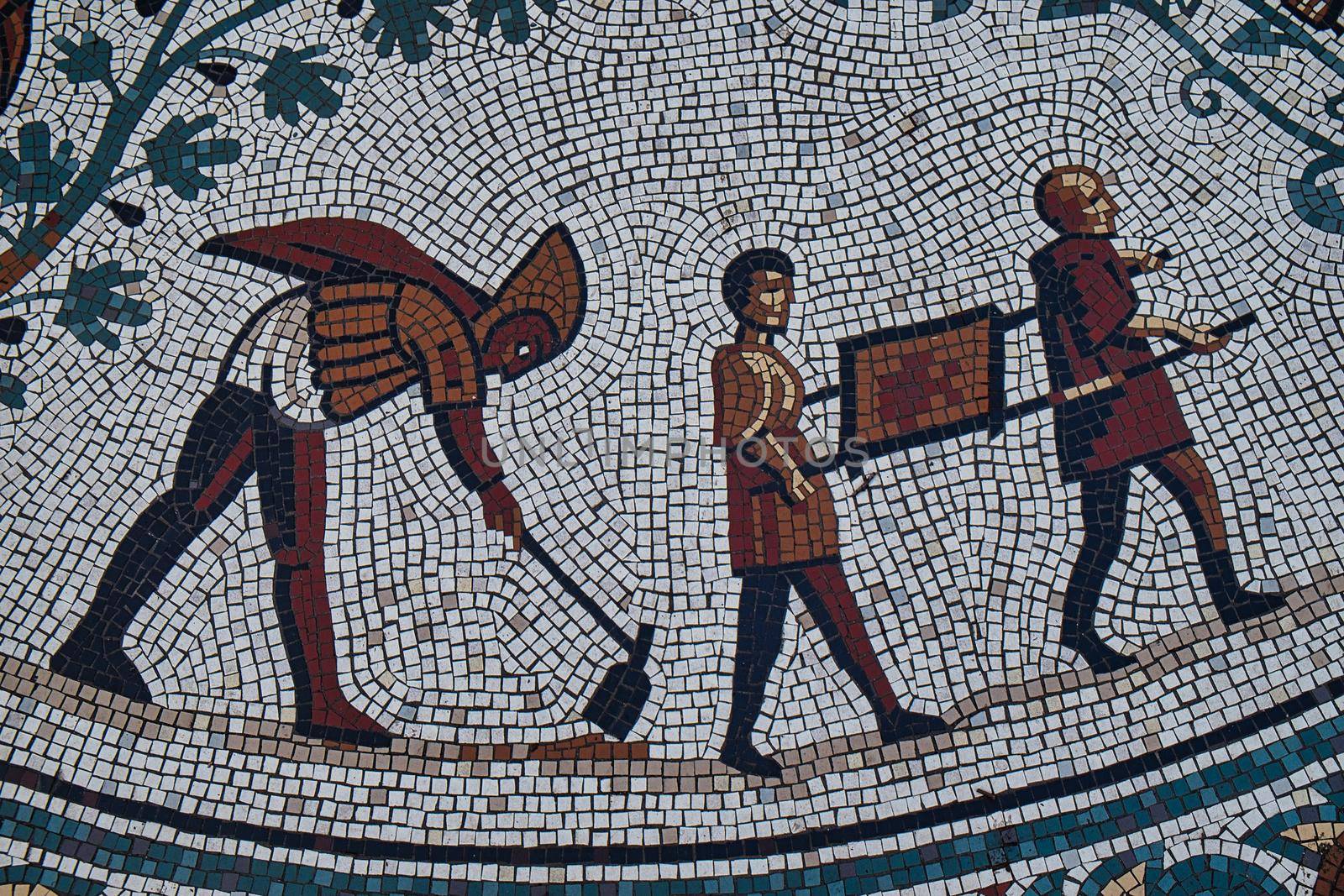 Modern Roman style mosaic of peasants carrying a tray of manure at the entrance of the Roman Gardens created for the Golden Jubilee of Chester Civic Trust 2010, Chester, England.