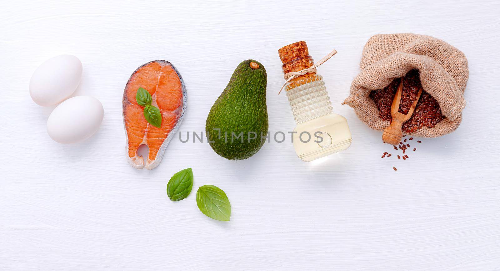 Ketogenic low carbs diet concept. Ingredients for healthy foods selection on white wooden background. by kerdkanno