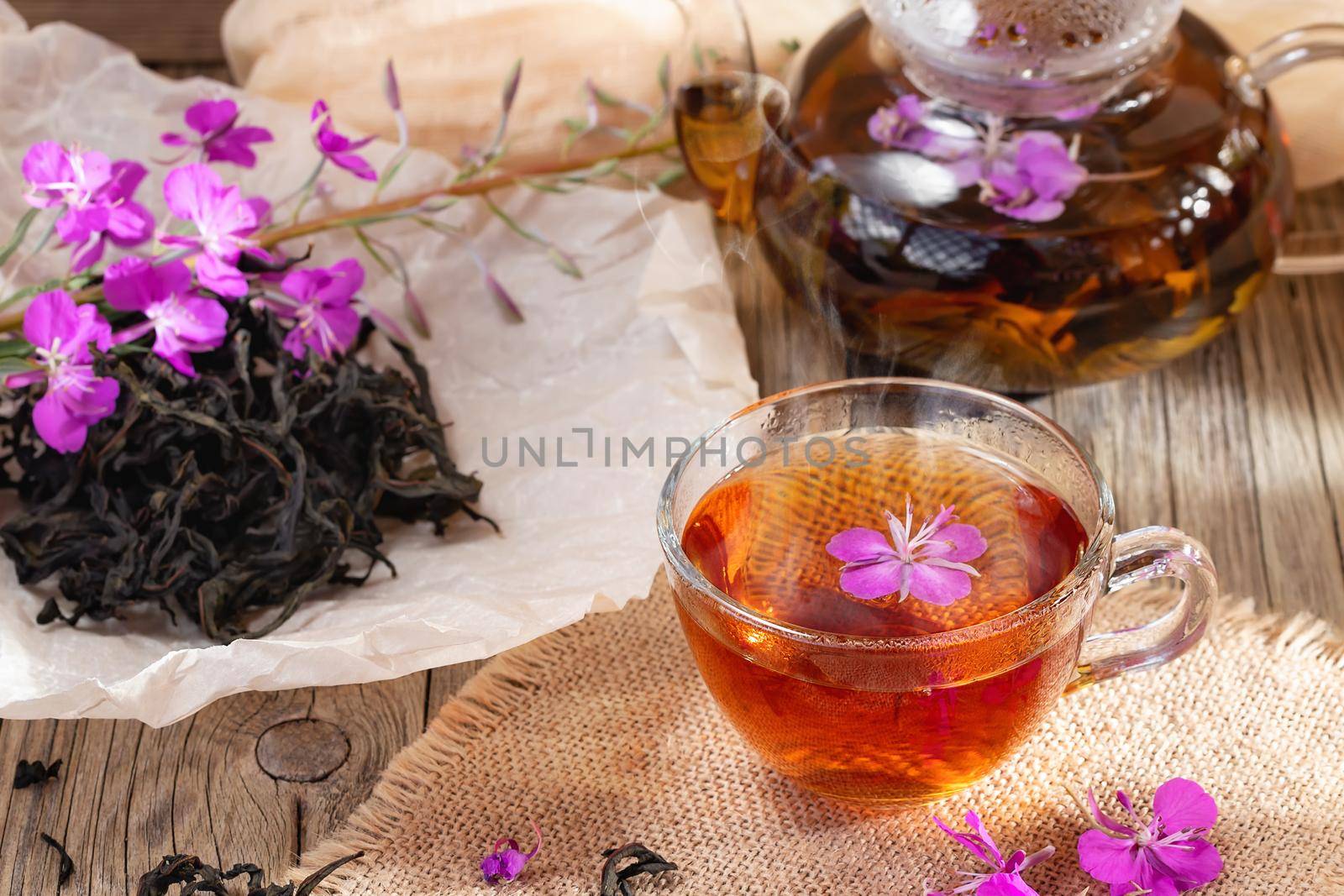 Herbal tea made from fireweed known as blooming sally in teapot and cup.