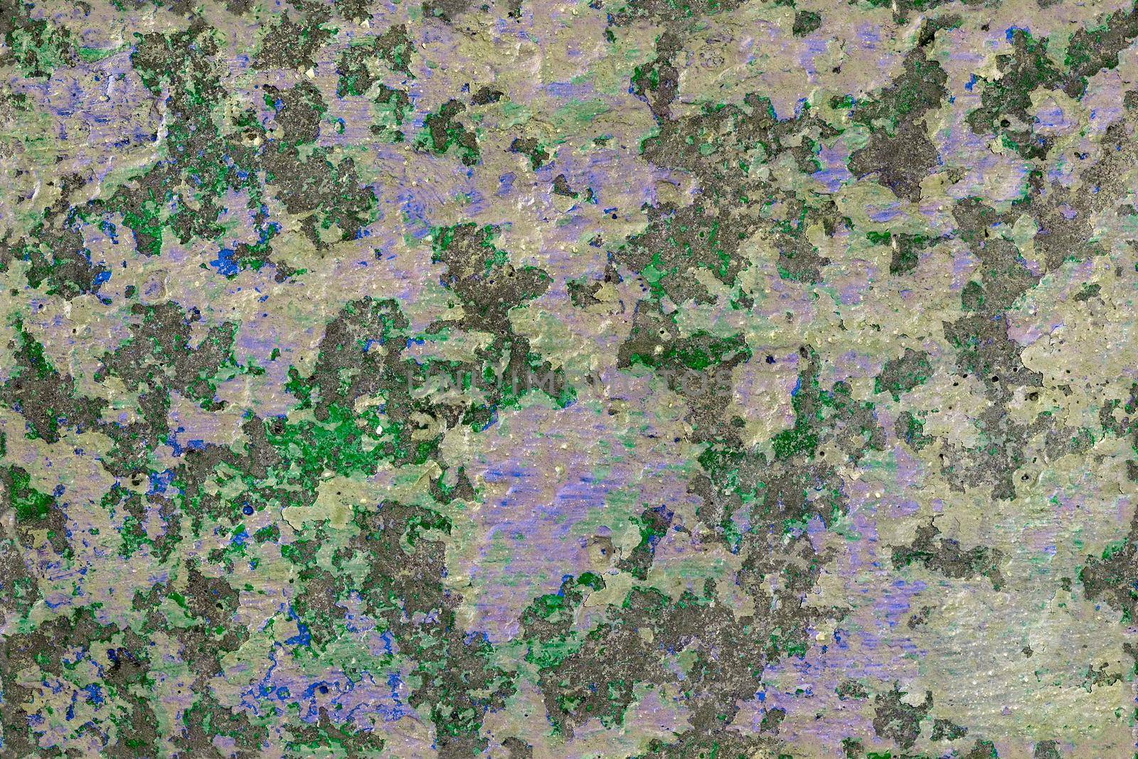 shabby peeled white, green and blue paint layers on concrete surface - flat background and seamless texture.