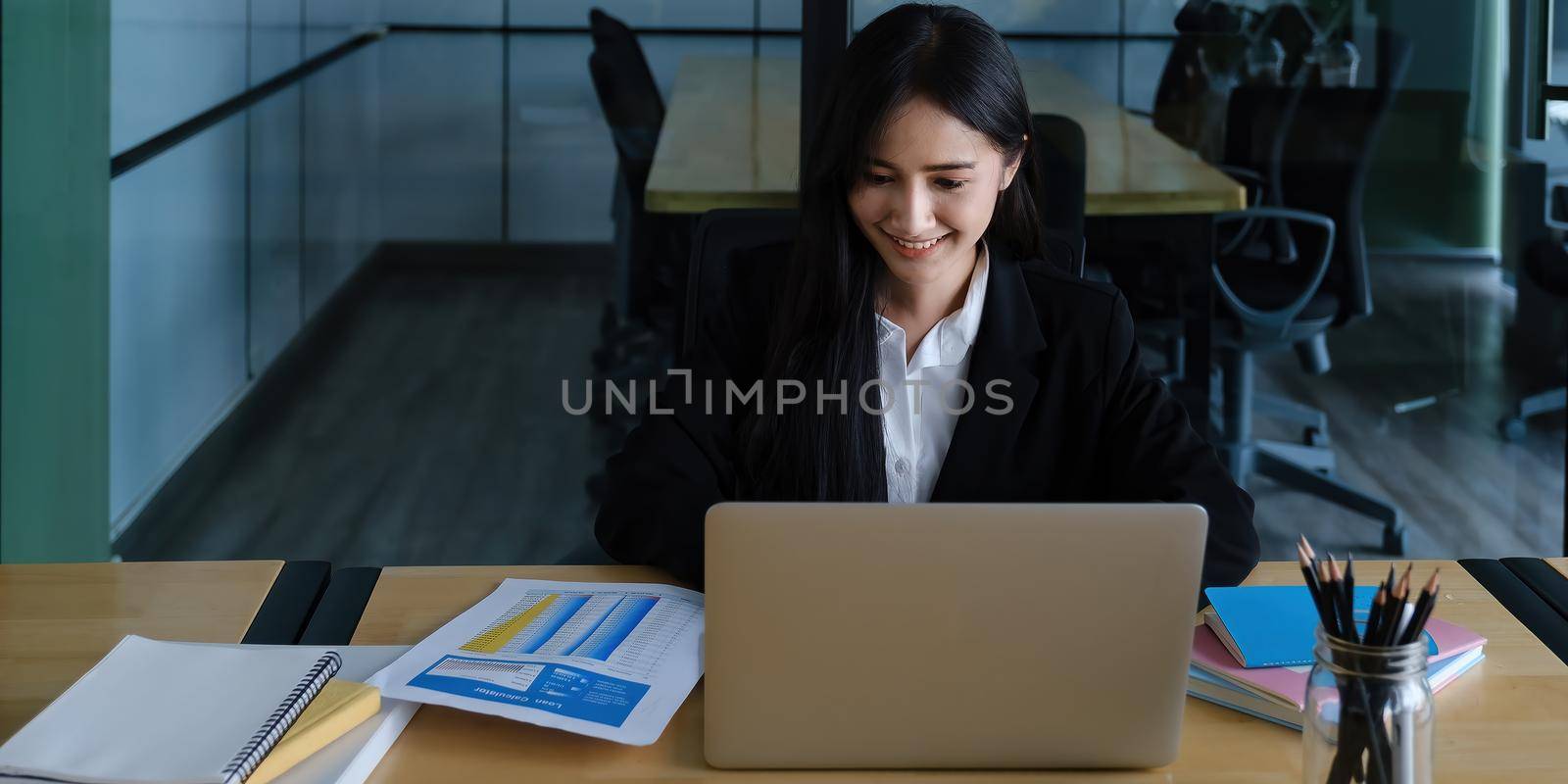 Video conference, Online meeting video call, Portrait of business woman looking at laptop computer screen working or watching webinar on laptop in workplace.