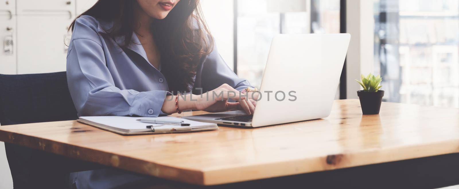 Fund managers researching and analysis Investment stock market by laptop computer