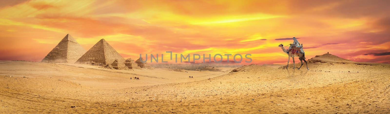 Colorful sunset over the pyramids in Giza, Egypt