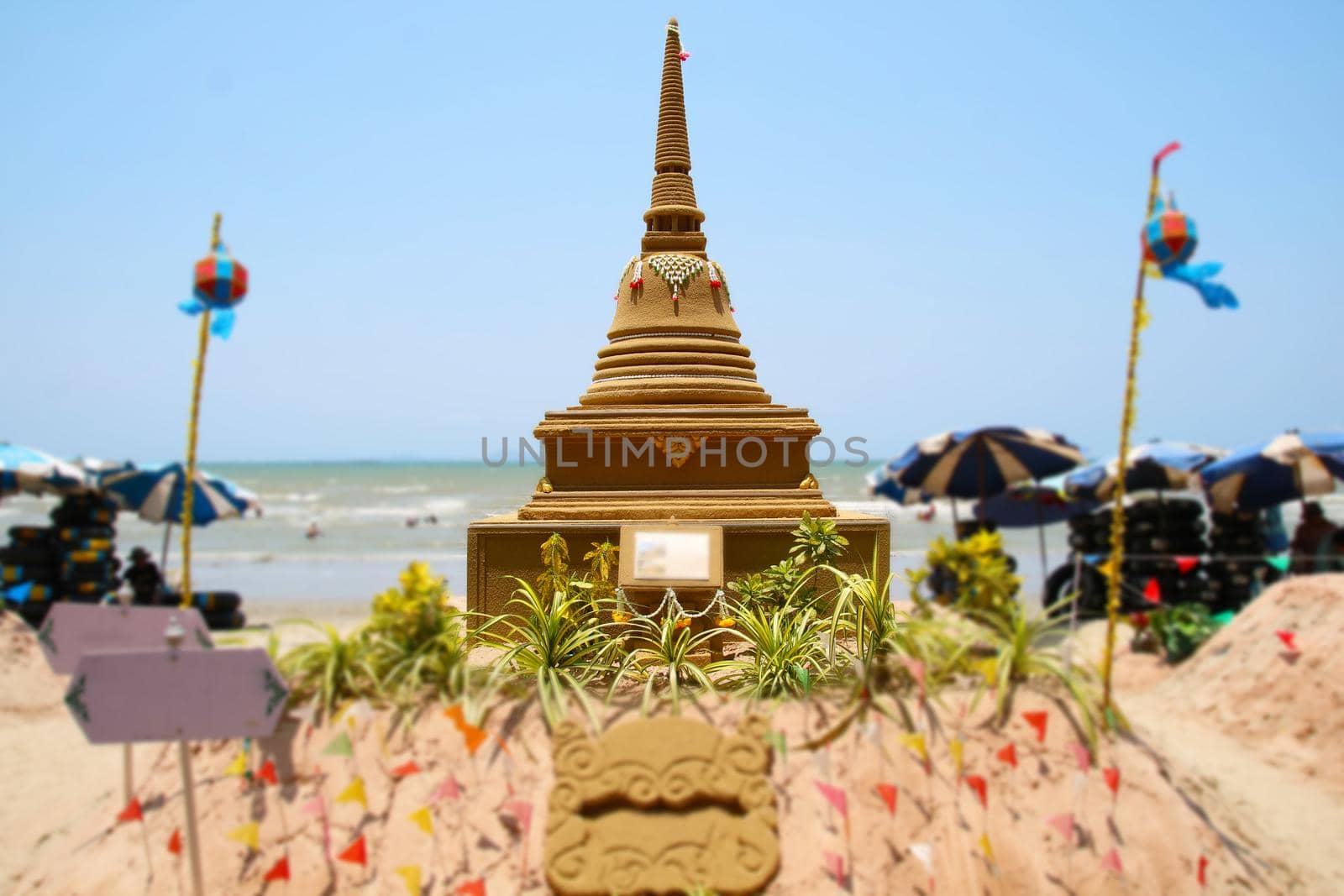 sand pagoda in Songkran festival represents In order to take the sand scraps attached to the feet from the temple to return the temple in the shape of a sand pagoda