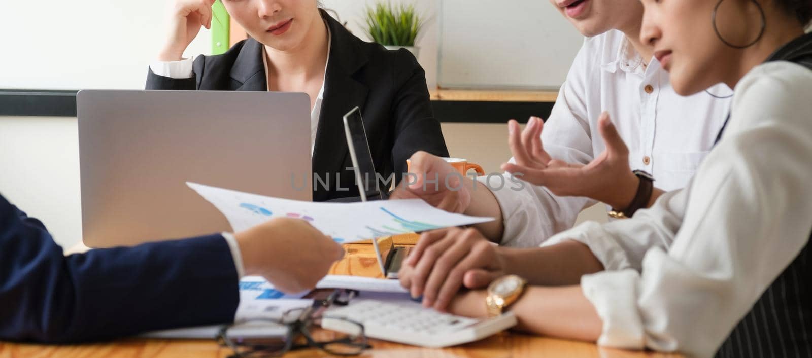 Group of Businessman and Accountant checking data document on digital tablet for investigation of corruption account . Anti Bribery concept. by itchaznong