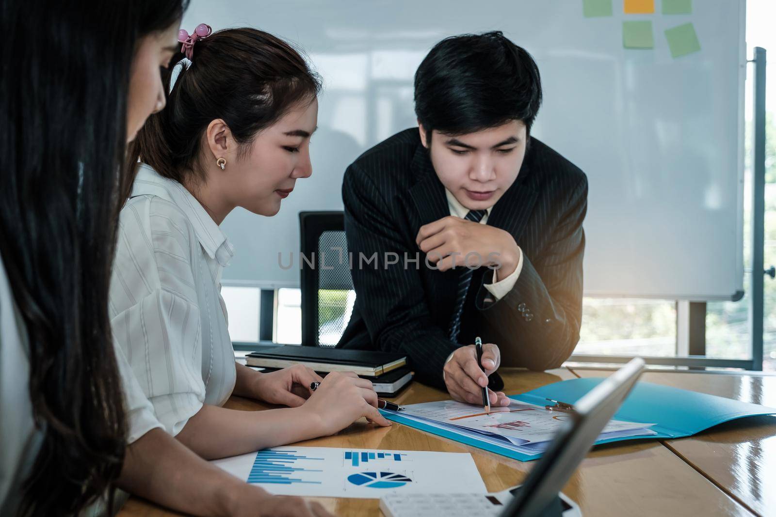 Group of Businessman and Accountant checking data document for investigation of corruption account . Anti Bribery concept. by itchaznong
