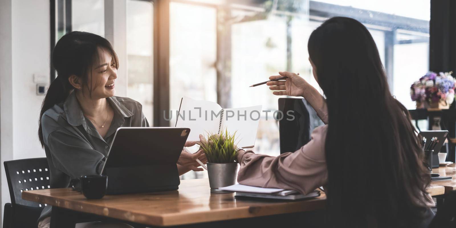 Analytics intelligence concept. Group of business people discuss current financial and economic on laptop for investment at the meeting. soft focus. by itchaznong