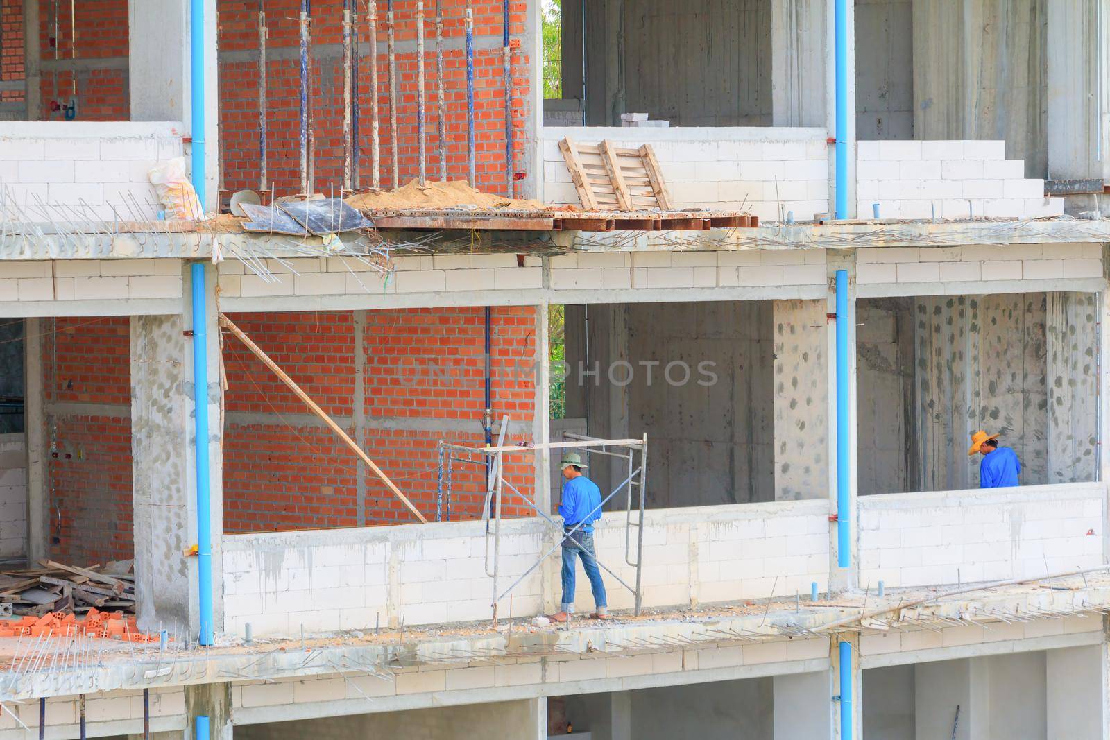 construction workers building develop of housing at laborer work outdoor.