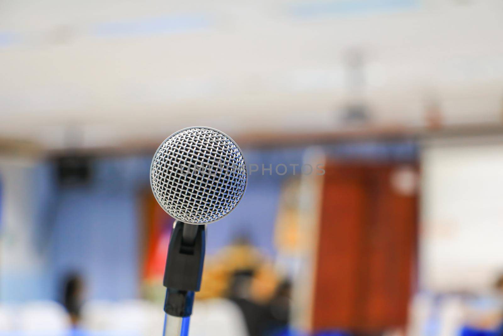 microphone wireless in a meeting room seminar conference background: Select focus with shallow depth of field. by pramot