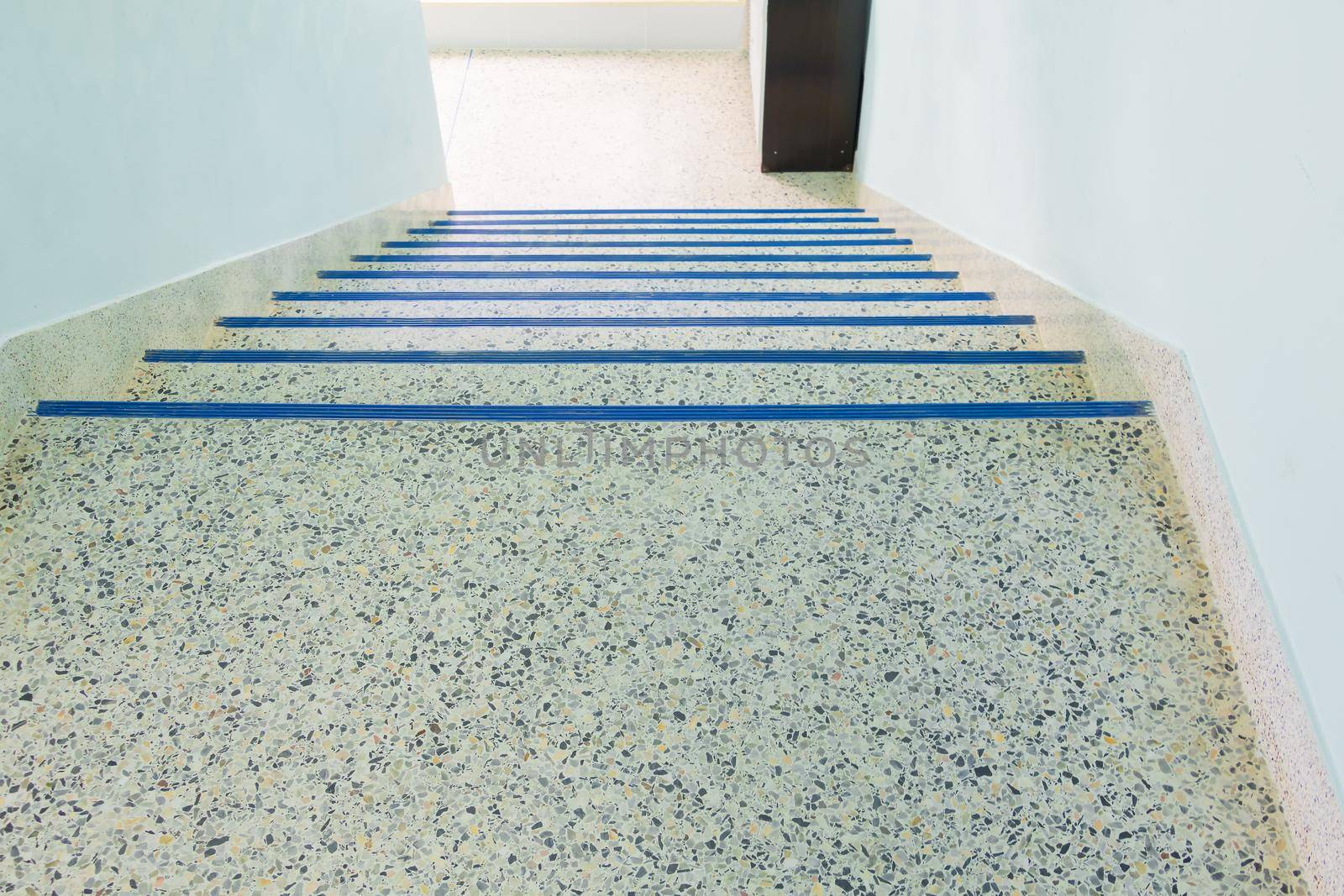 stairs walkway down terrazzo floor. select focus with shallow depth of field