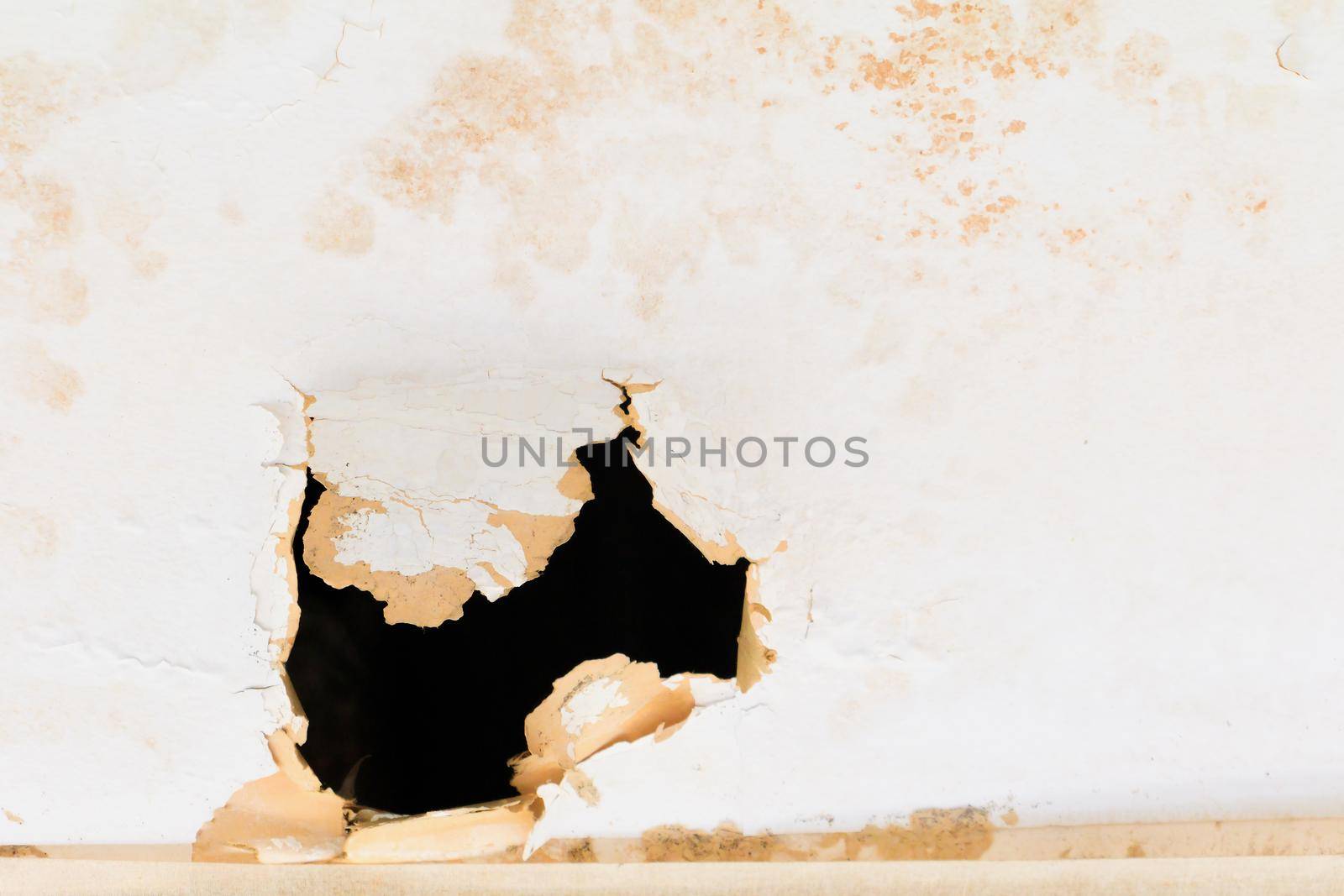 gypsum ceiling inside damaged by water leaking by pramot