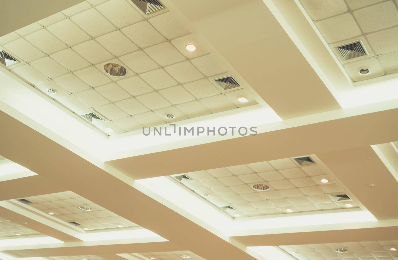 ceiling of business interior office building and light neon. vintage style tone with copy space add text
