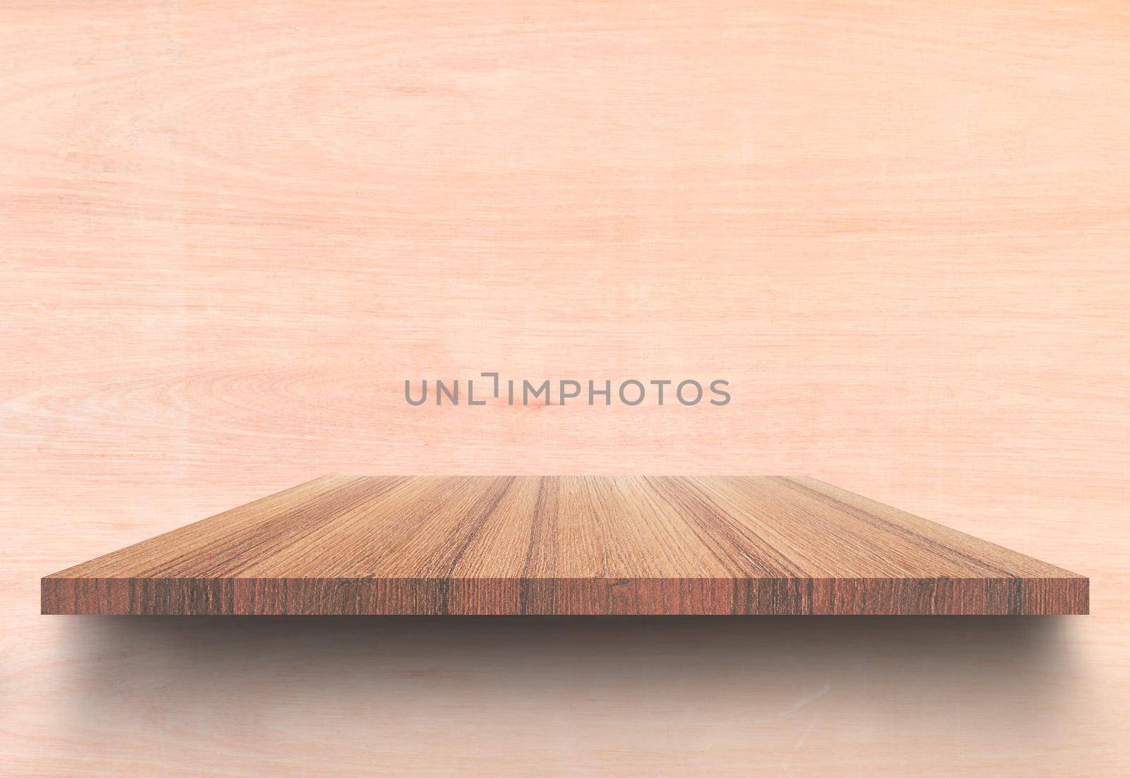 Empty top wooden shelves and woody wall background. For product display with copy space add text by pramot