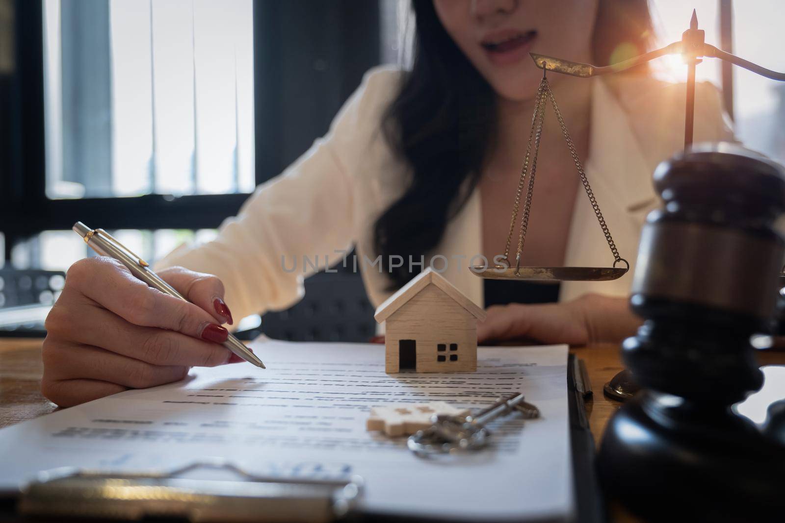 Lawyer checking agreement document before sending to client. by itchaznong