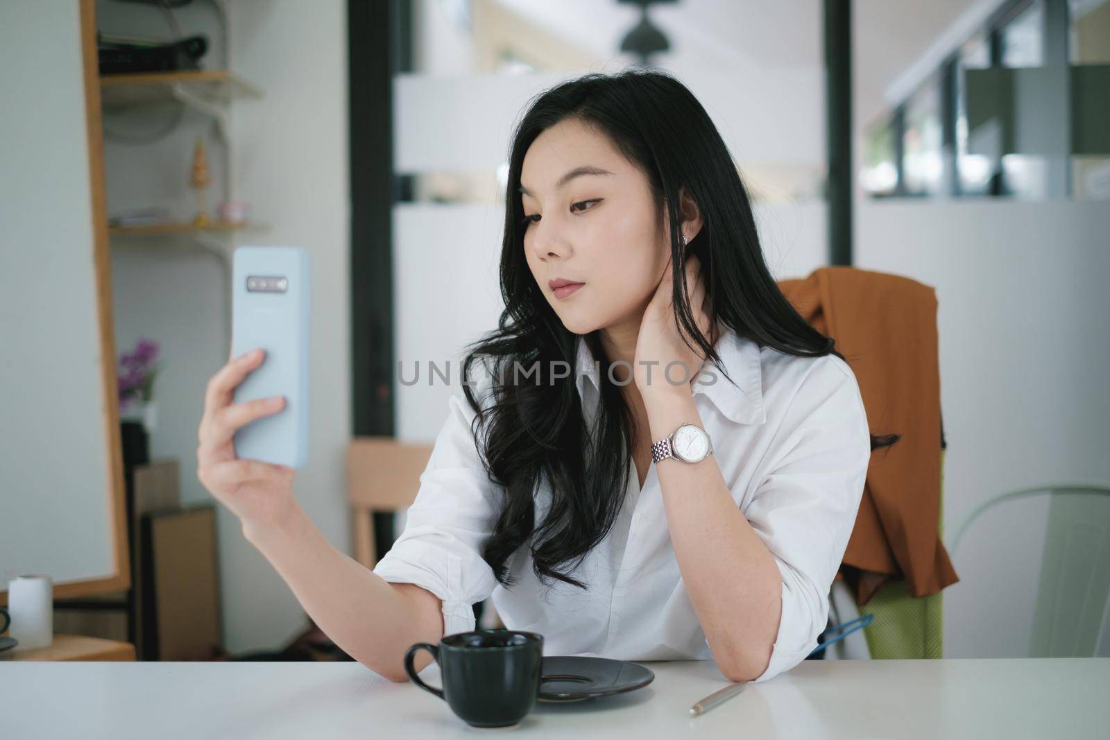 Portrait of Asian Business woman working from home. Accounting concept