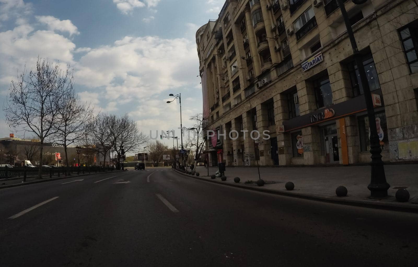 Changes and complications caused by coronavirus epidemy, world without crowds, virus empties streets. No traffic jam, no pollution, empty streets in downtown Bucharest, Romania, 2020