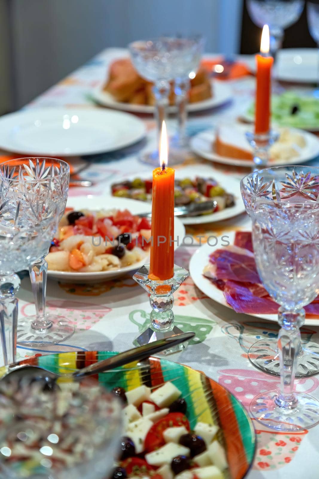 Ornately set table with spanish ham by Digoarpi
