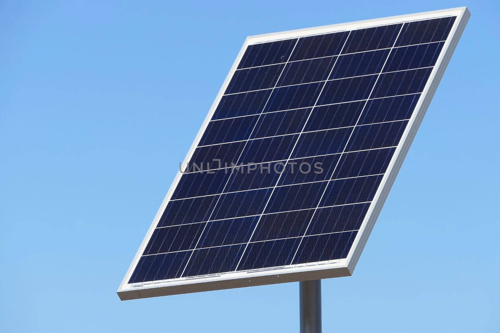 Solar panels or electric battery against the blue sky is isolated. High quality photo