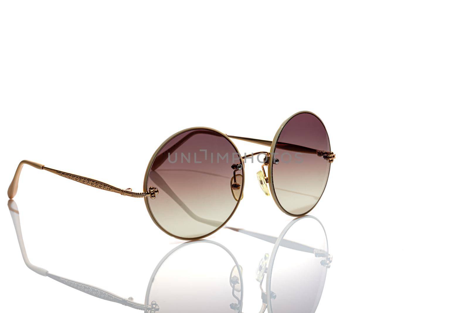 Protective glasses from the sun on a white background. Isolate. Healthy eyes. by klimatis019