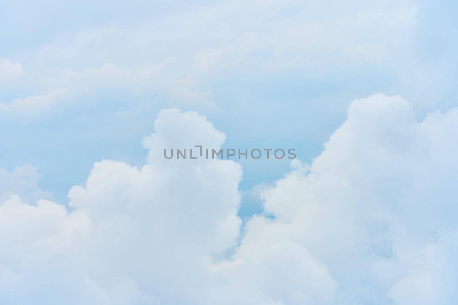Landscape of fluffy white clouds on a dark blue sky. View from the plane at high altitude by Try_my_best