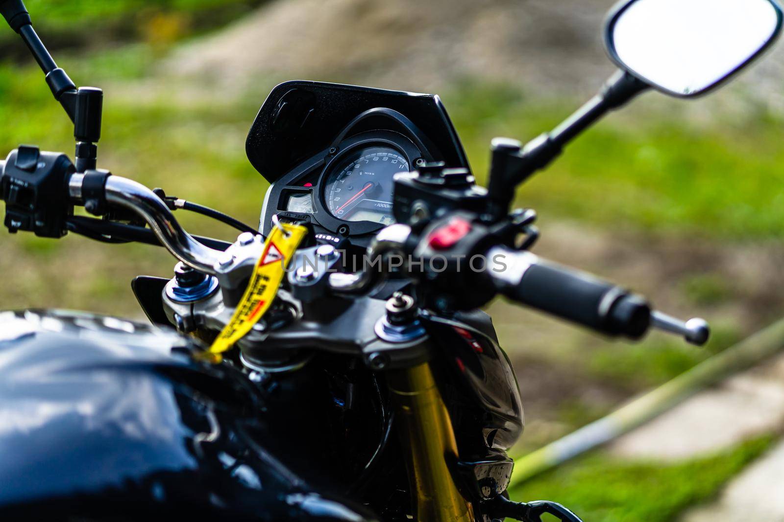 Detail of black motorcycle. Honda Hornet motorcycle detail photo in Bucharest, Romania, 2021