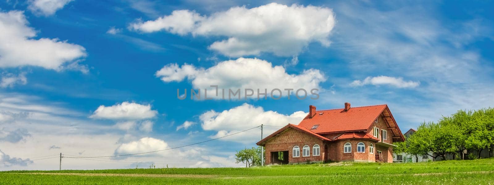 Panoramic view of the countryside on blue sky