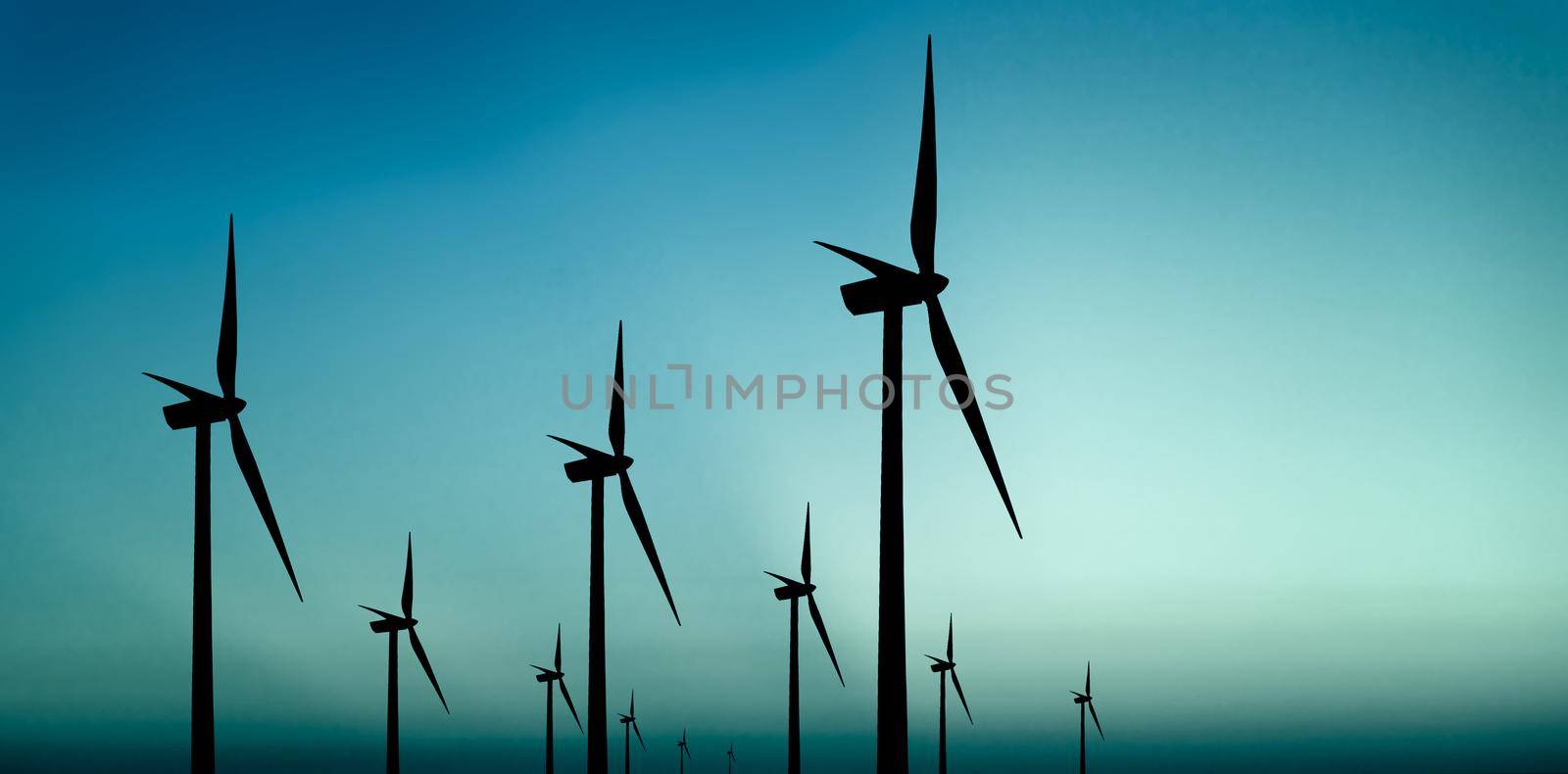 Wind turbines silhouette on blue background