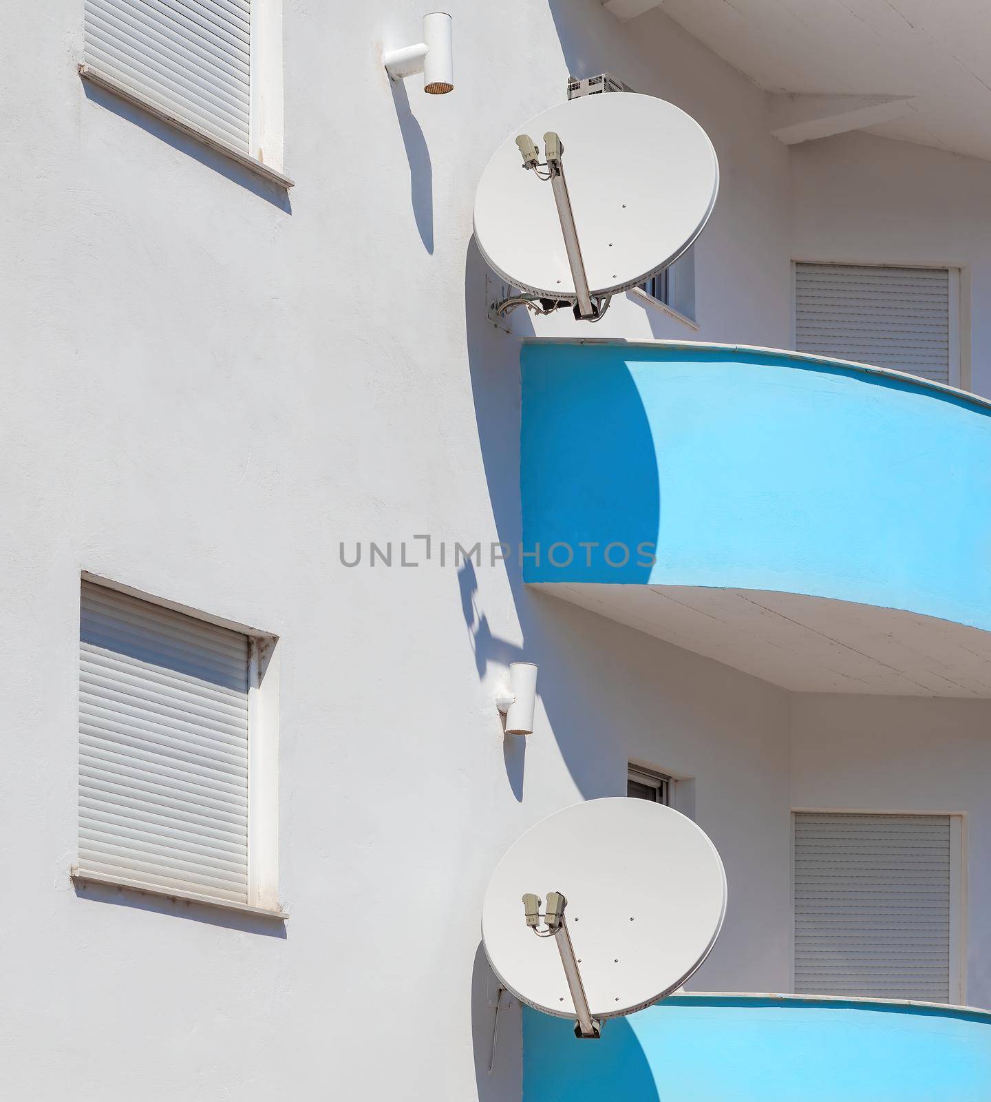 Old apartment balconies and satellite dishes