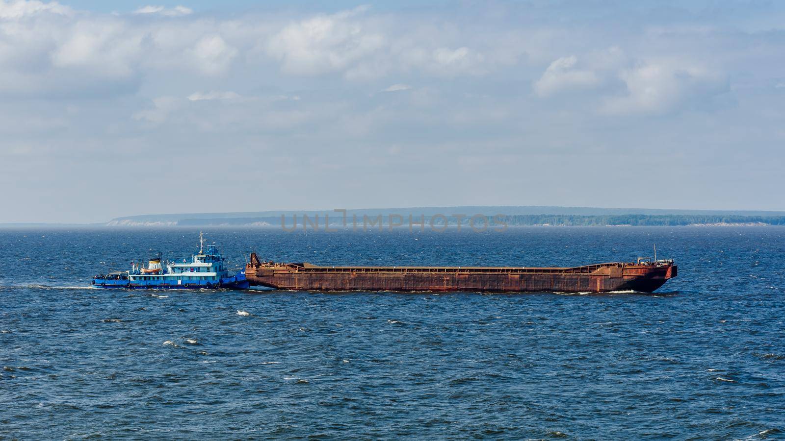 Blue cargo ship on the Volga river