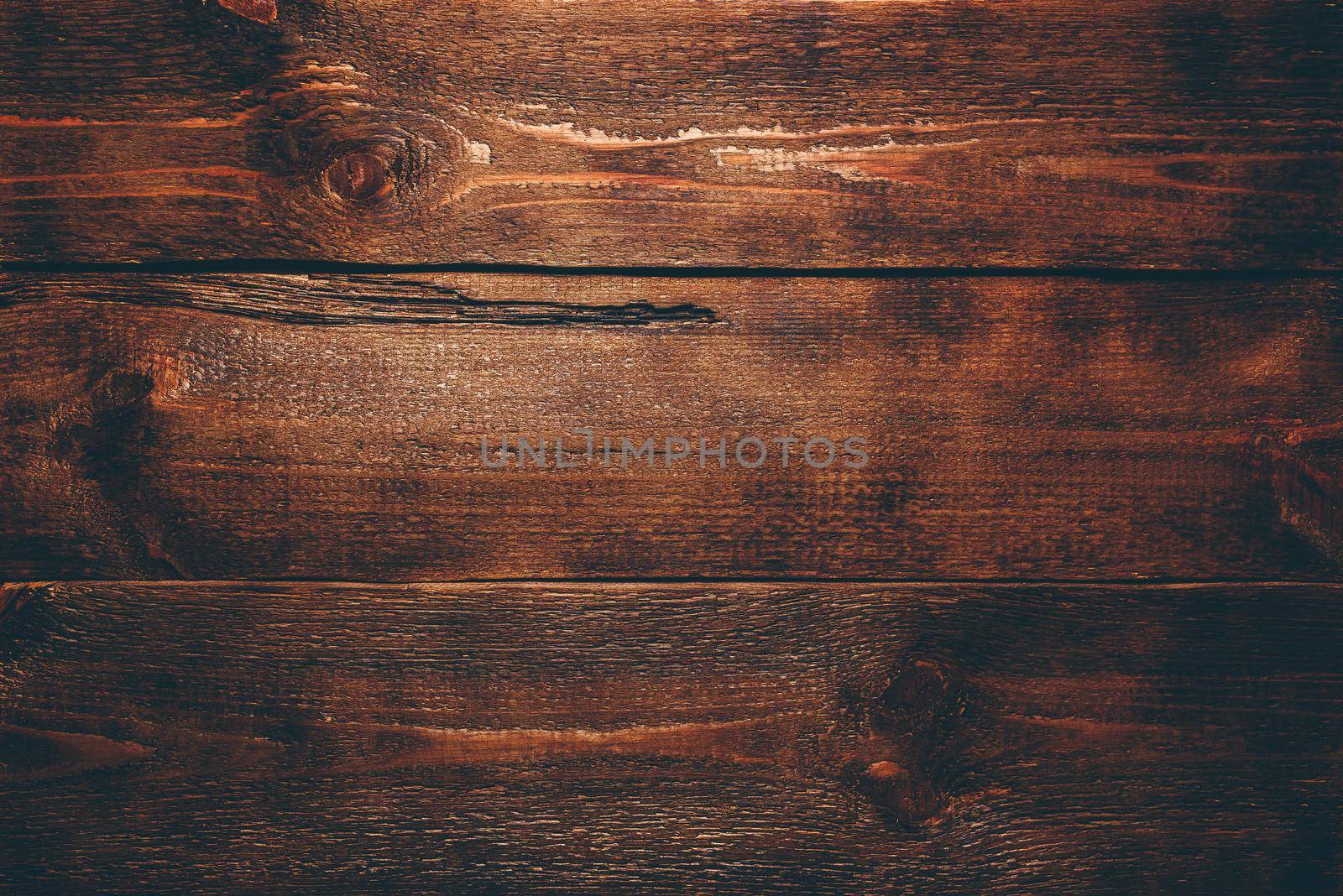 Old dark wooden surface. View from above
