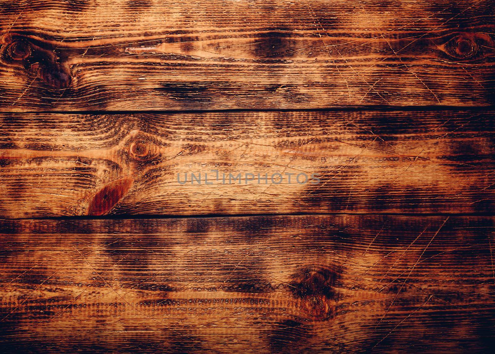 Old wooden surface with scratch and stains
