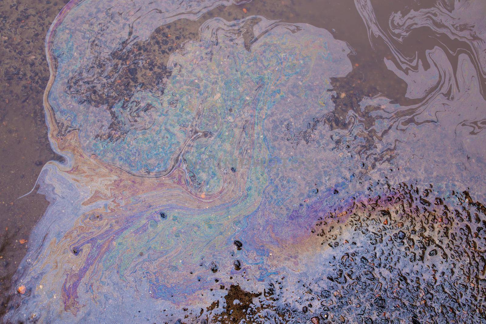 Beautiful abstract colorful background, marbling texture, engine oil stains on asphalt