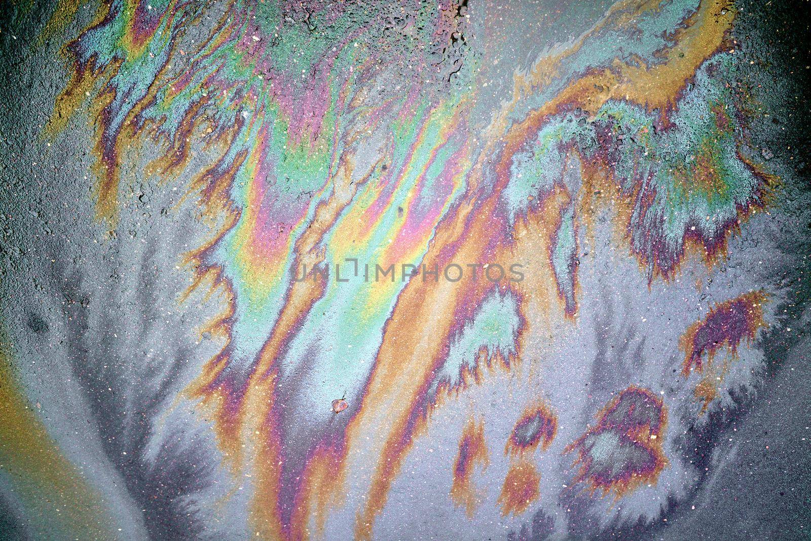 Gasoline stain on Asphalt, color Oil fuel spots on Asphalt Road as Texture or Background