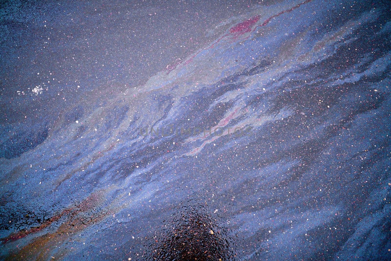 Gasoline stain on Asphalt, color Oil fuel spots on Asphalt Road as Texture or Background
