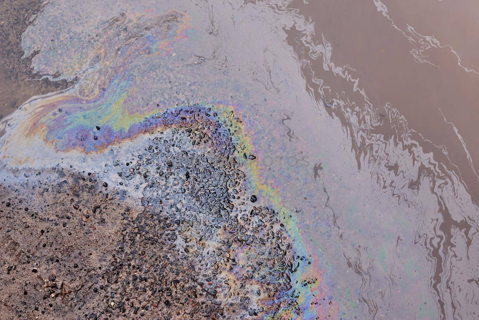 Gasoline stain on Asphalt, color Oil fuel spots on Asphalt Road as Texture or Background