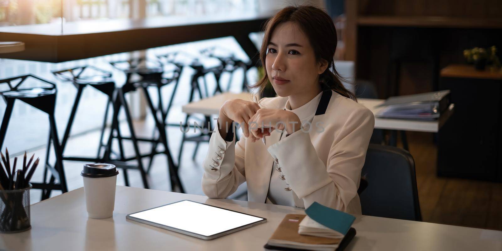 Fashion asian woman designer using digital tablet