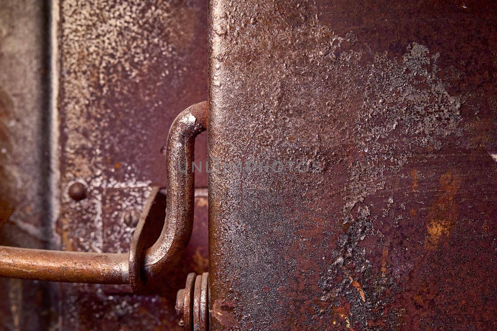 Rusted door of an old clay muffle kiln