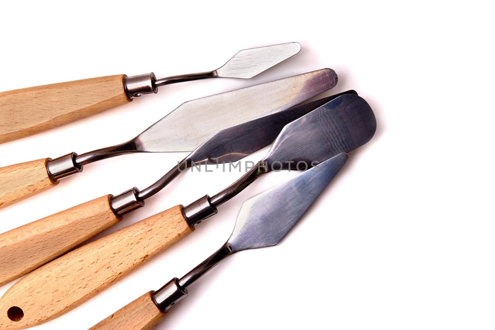 a set of palette knives for drawing isolated on white background