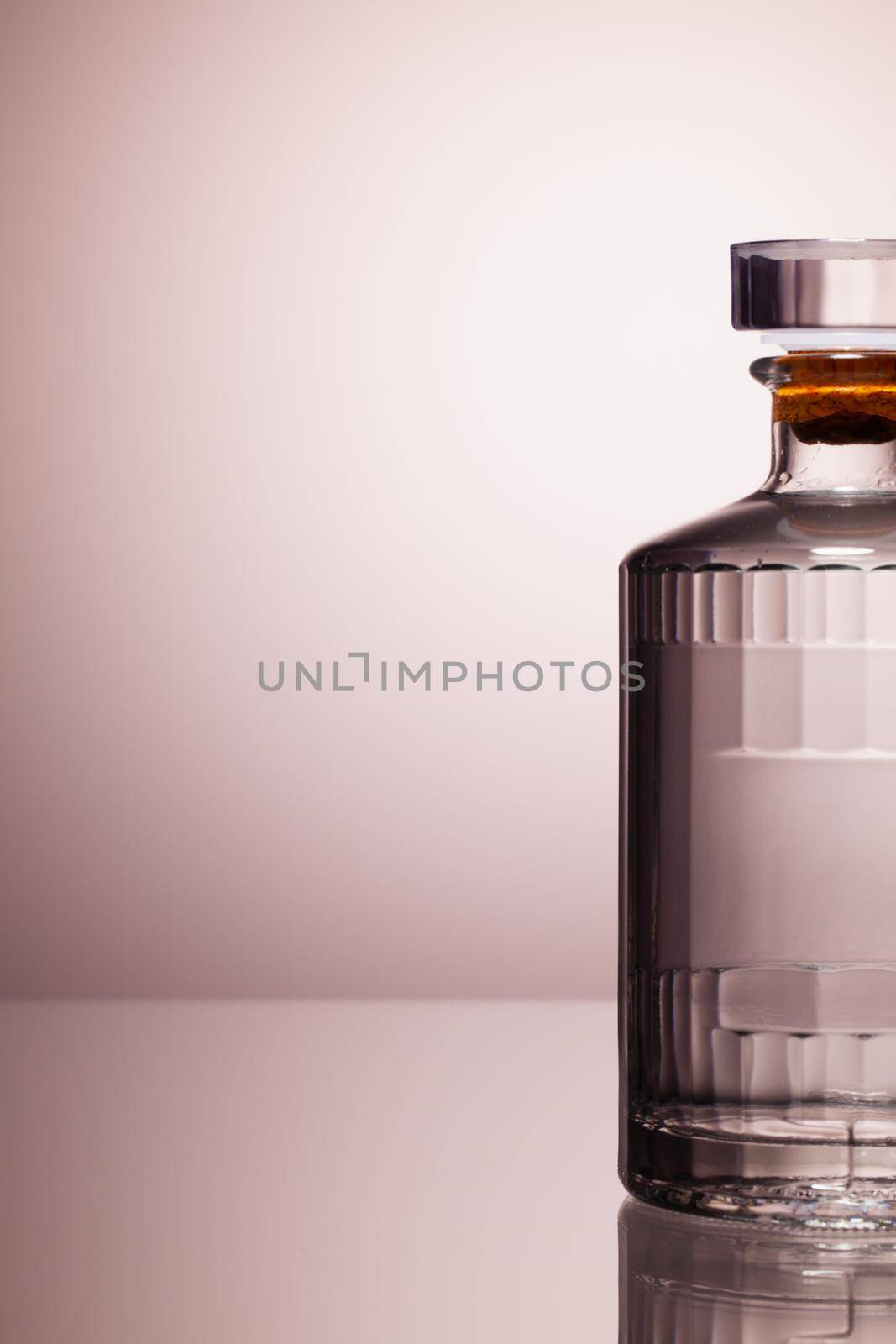 White Glass of Gin on the glass table. by CaptureLight