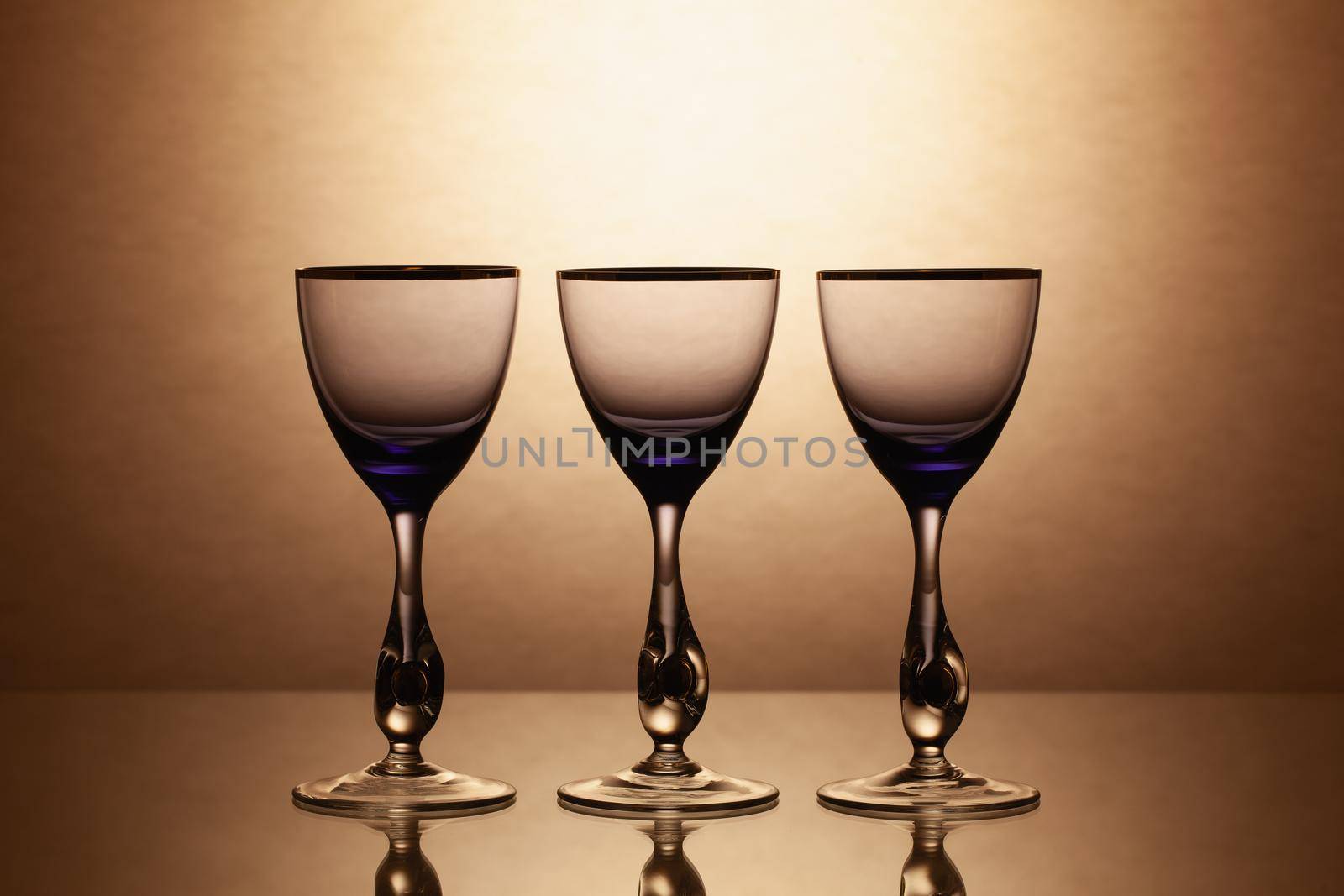 Empty drinking transparent wine glasses by CaptureLight