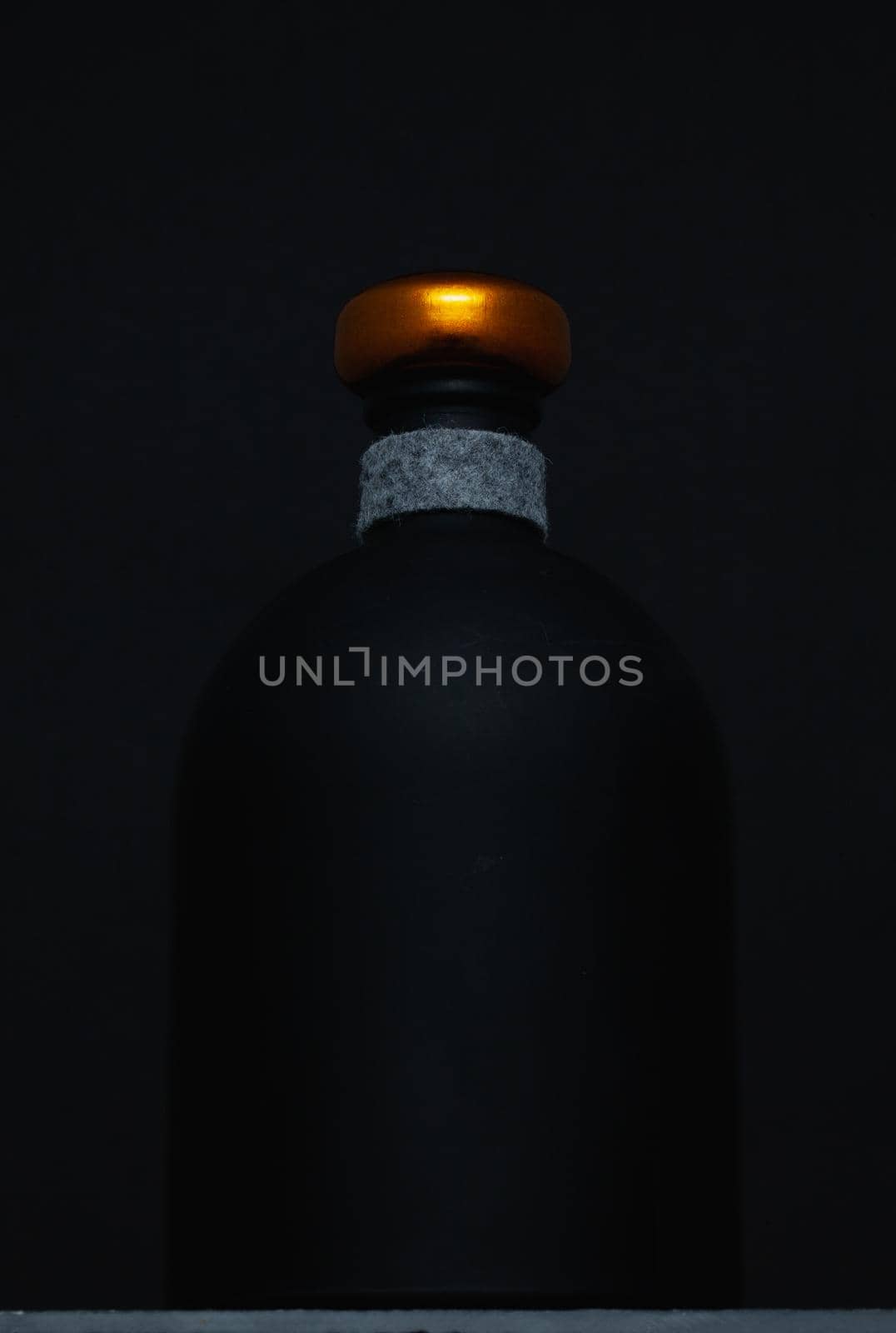 Empty Luxury Black Glass Whiskey on the black background