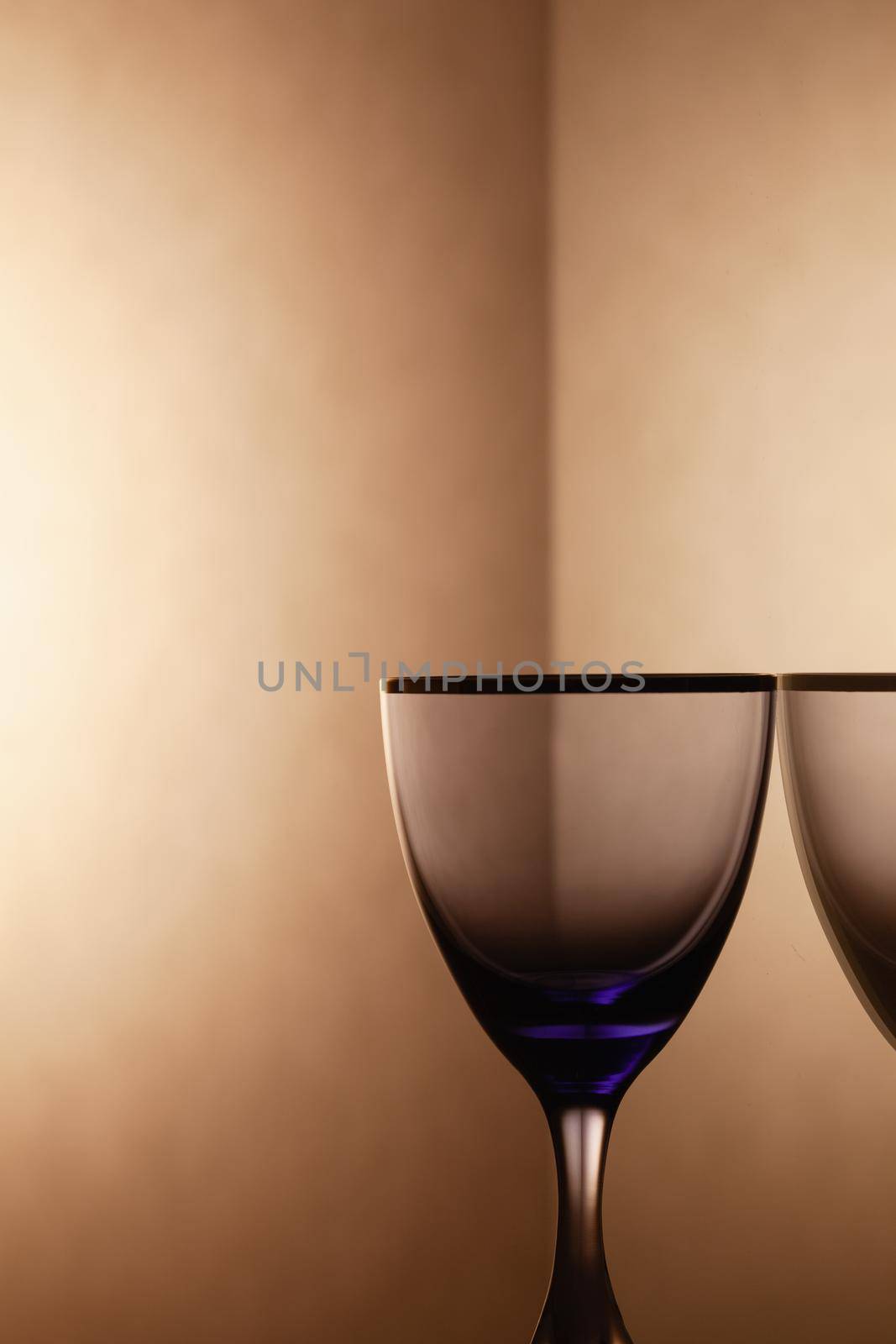 Empty drinking transparent wine glass by CaptureLight