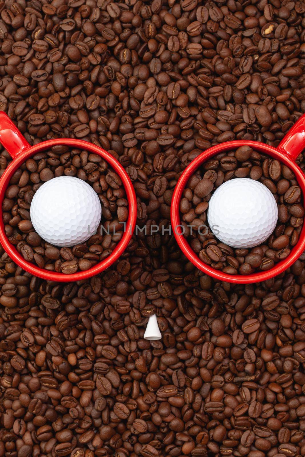 Two red cups full of coffee beans and one golf ball.  Funny owl. by CaptureLight