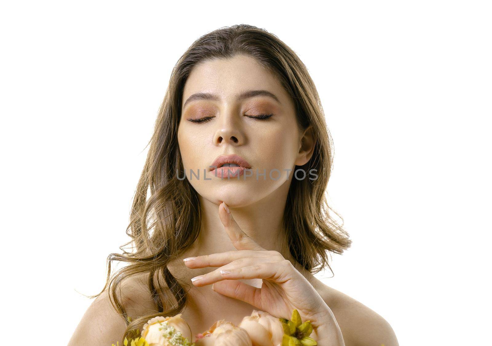 Beautiful girl closing her eyes posing in studio isolated on white background.